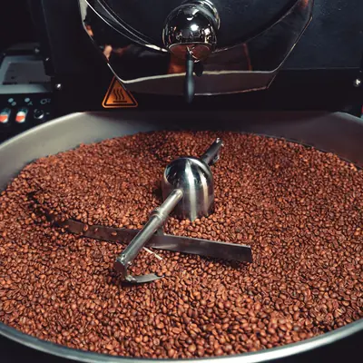 Freshly roasted beans turning in the cooling drum at our roastery