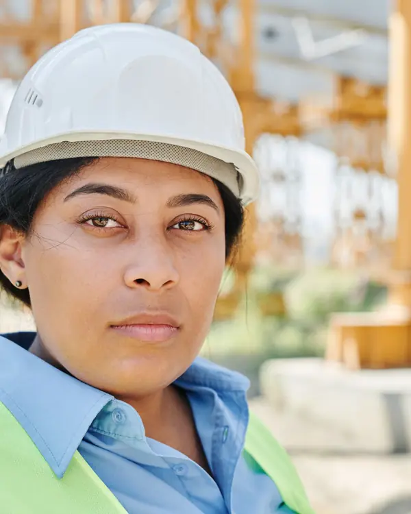 Renee Okafor in a white hard hat and safety vest