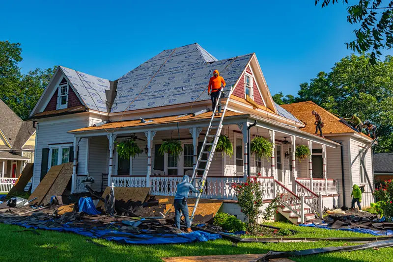 Crew replacing the roof on a Victorian-era home in Weatherford
