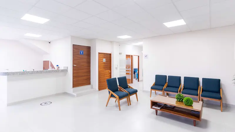 A bright, quiet NorthStar waiting room with blue chairs